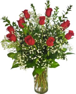 Timeless and classic. Our Deluxe one dozen long stem red roses come with premium green foliage and delicate accent flowers.