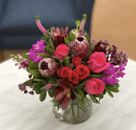 An alluring assortment of burgundy, red and pink blooms. 